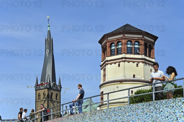 Rhine embankment promenade, Rhine embankment promenade with St. Lambertus Church and castle tower,