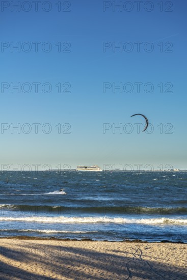 Kitesurfing in the Bay of Kiel in strong winds, high swell, Strande near Kiel,