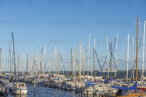 Strande marina near Kiel, Rendsburg-Eckernförde district, AIDA, ship masts, dolphins, Baltic Sea,