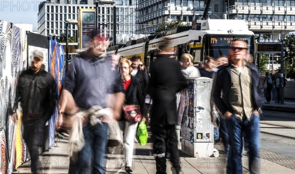 A long exposure shows people at a tram stop at Alexanderplatz, Berlin, 27/09/2025, Berlin, Berlin,