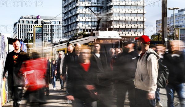 A long exposure shows people at a tram stop at Alexanderplatz, Berlin, 27/09/2025, Berlin, Berlin,