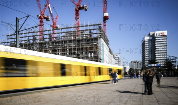 Tram at Alexanderplatz, in the background construction of a high-rise building, Berlin, 27.09.2025,