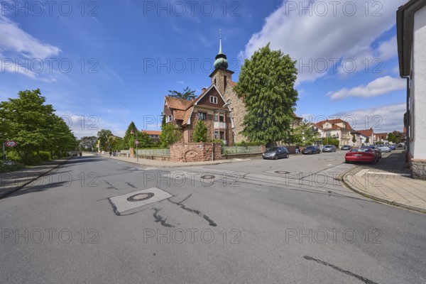 Chapel of the motherhouse St. Vinzent, general architecture, trees, car park with vehicles, blue
