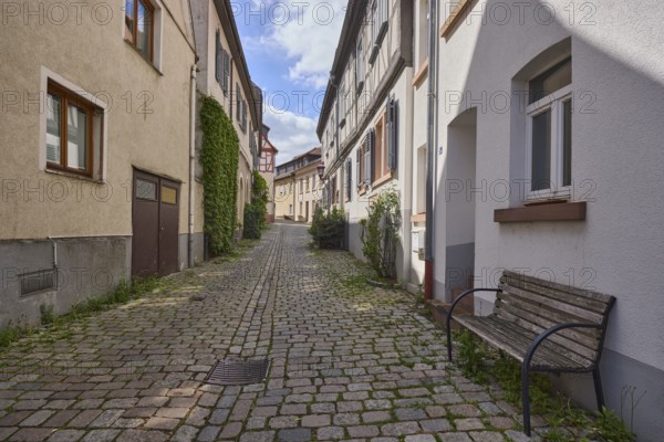 Old town, alley, cobblestone pavement, historic half-timbered houses, historic buildings, facades