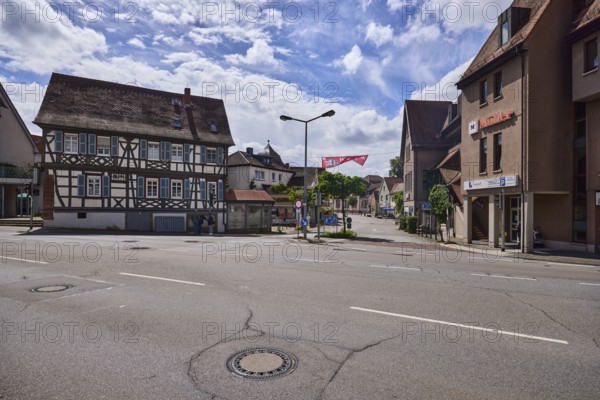 Historic half-timbered house, streets, general architecture, lantern, backlight, blue sky, cumulus