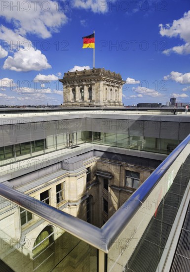 Viewing platform with a German flag in the wind on one of the corner towers and a view of an inner