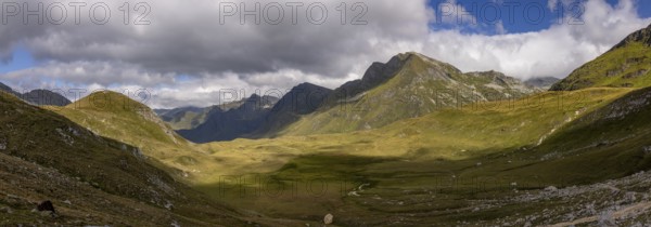 Panorama from Passo del Sole to Passo dell'Uomo and Alpe Carorescio with Piano Grande plateau,