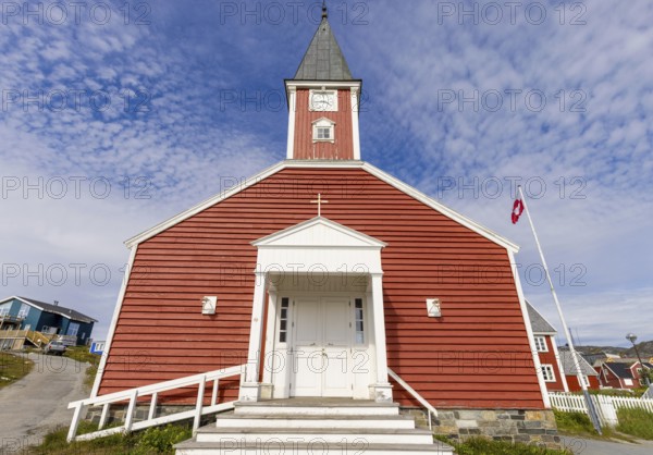 Panoramic view of Greenland capital Nuuk with church and colored houses located near fjords and