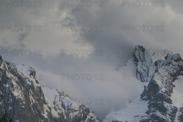 Rising clouds and detailed view of the Sorapis mountain group, Punta Sorapiss, Dolomites, South