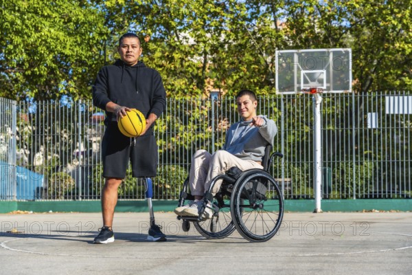 Men with diverse disabilities, one using a prosthetic leg and holding a basketball, the other