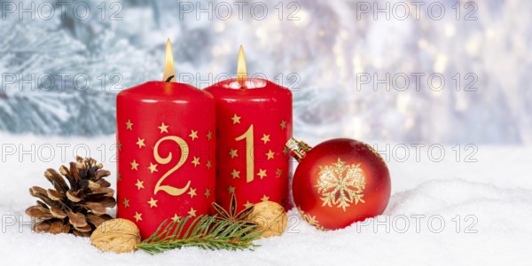 Second 2nd Advent candle for Christmas Christmas card in winter with text free space Copyspace