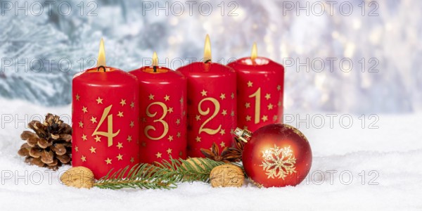 Fourth 4th Advent candle for Christmas Christmas card in winter with text free space Copyspace