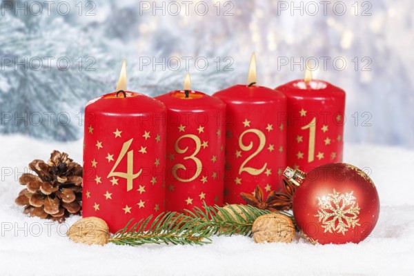 Fourth 4th Advent candle for Christmas Christmas card in winter with copy space Copyspace in