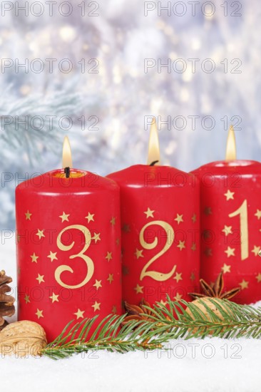 Third 3rd Advent candle for Christmas Christmas card in winter with copy space Copyspace in