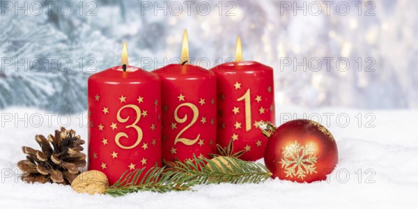 Third 3rd Advent candle for Christmas Christmas card in winter with text free space Copyspace