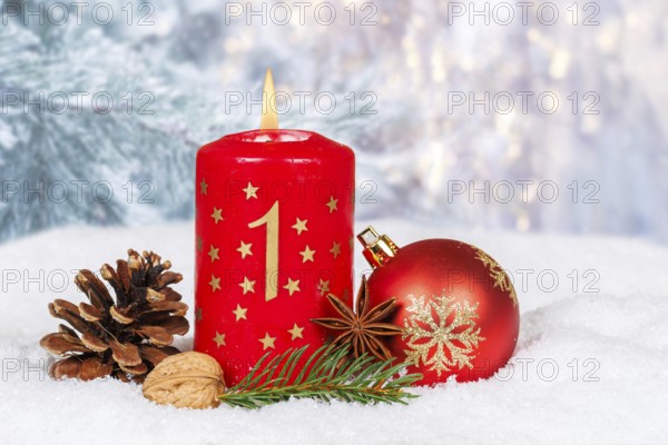 First 1st Advent candle for Christmas Christmas card in winter with copy space Copyspace in