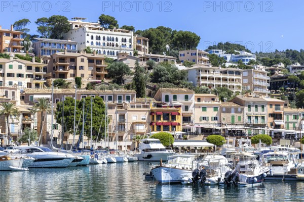 Port de Soller town on Majorca holiday by the sea yacht harbour with boats trip in Port de Sóller,