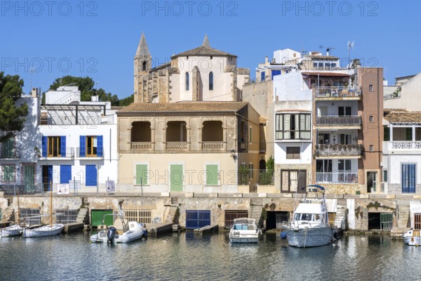 Colourful houses in Portocolom Fishing village on Majorca with boats Seaside holiday in Portocolom,