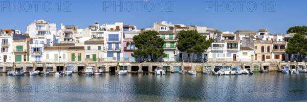 Colourful houses in Portocolom Fishing village on Majorca with boats Holiday by the sea Panorama
