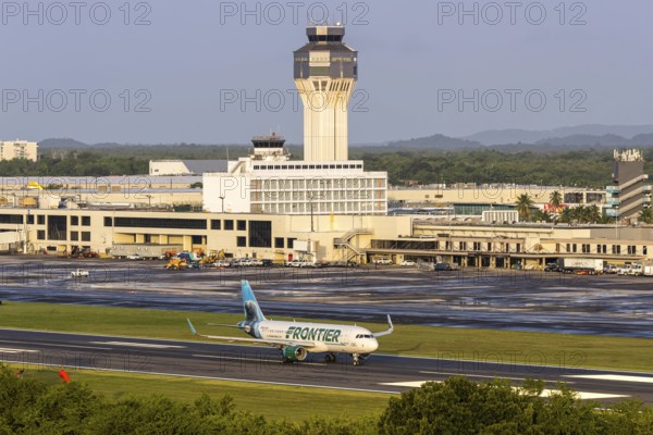 A Frontier Airlines Airbus A320 aircraft with the registration number N238FR at San Juan Airport,