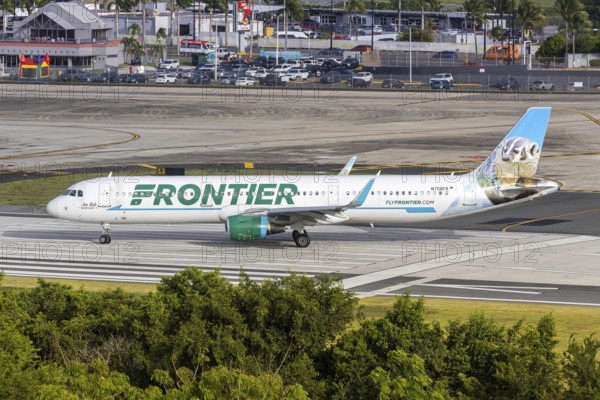 A Frontier Airlines Airbus A321 aircraft with the registration number N708FR at San Juan Airport,