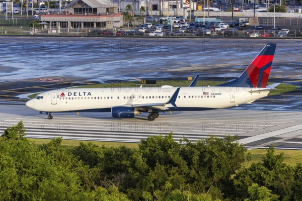 A Boeing 737-900ER aircraft of Delta Air Lines with the registration number N848DN at San Juan