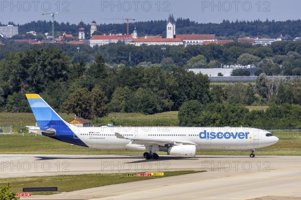 An Airbus A330-300 aircraft of Discover Airlines with the registration D-AIKO at Munich Airport,