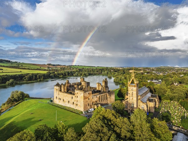 Rainbow over Linlithgow Palace from a drone, Linlithgow Loch, West Lothian, Scotland, United