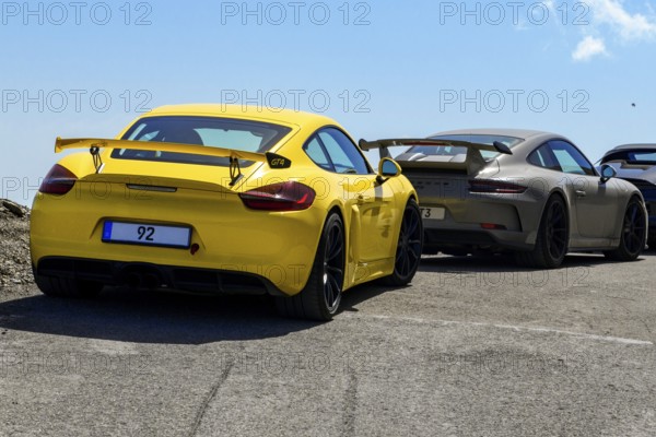 Sports car for public traffic Road-approved road version of racing car with rear wing spoiler with