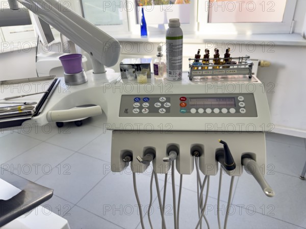 Instruments drills for dental treatment dental hygiene on panel board console with digital display