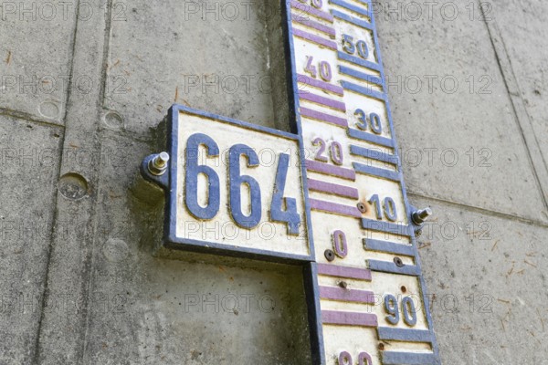 Close up of water level gauge on dam wall at Schwarzenbachtalsperre in the Black Forest region in