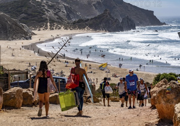 Praia do Amado beach near Carrapateira, popular with surfers, wave riders, rocky coast, steep coast