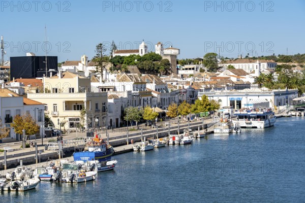 The old town centre of Tavira, on the Gilao River, boats, fishing boats, waterfront promenade, in