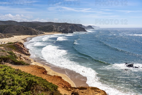 Praia do Amado beach near Carrapateira, popular with surfers, wave riders, rocky coast, steep coast