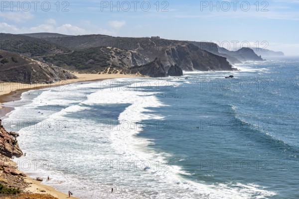 Praia do Amado beach near Carrapateira, popular with surfers, wave riders, rocky coast, steep coast