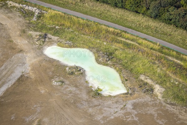 Aerial view, greenish shimmering pond at the landfill Wehofen, Averbruch, Dinslaken, Ruhr area,