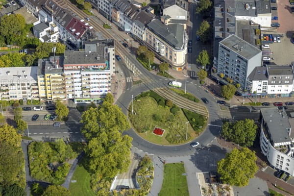 Aerial view, green roundabout and flower bed at D'Agen square and tram line, Dinslaken, Ruhr area,