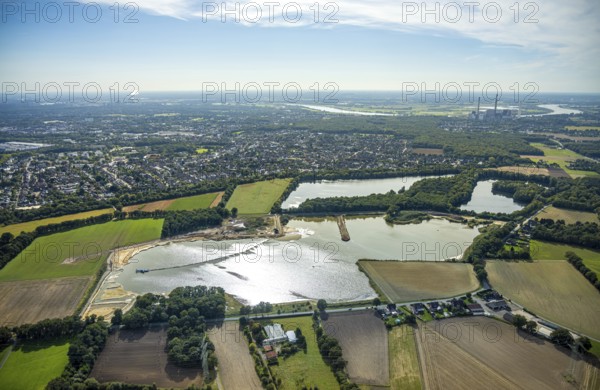 Aerial view, Schwarzer Weg quarry pond, view of Voerde and Voerde power station, Bruckhausen,