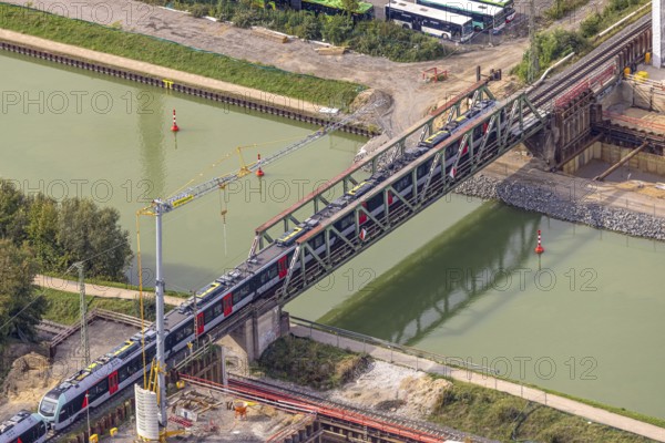 Aerial view, S-Bahn over a railway bridge Wesel-Datteln-Kanal, construction site and demolition of