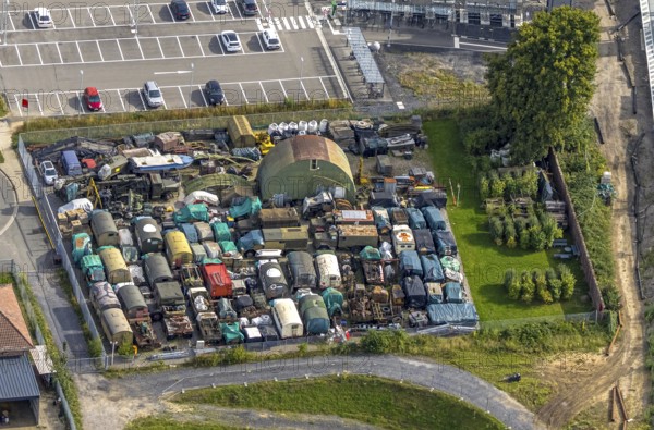 Aerial view, scrap yard with old military trucks at Friedrichsfeld (Lower Rhine) railway station,