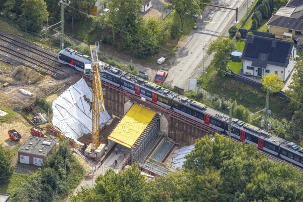 Aerial view, S-Bahn and railway line across Spellener Straße, bridge construction and extension of