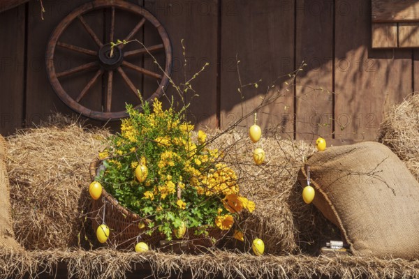 Easter eggs, artificial flowers and flour sacks as decoration at the Bremer Osterwiese folk