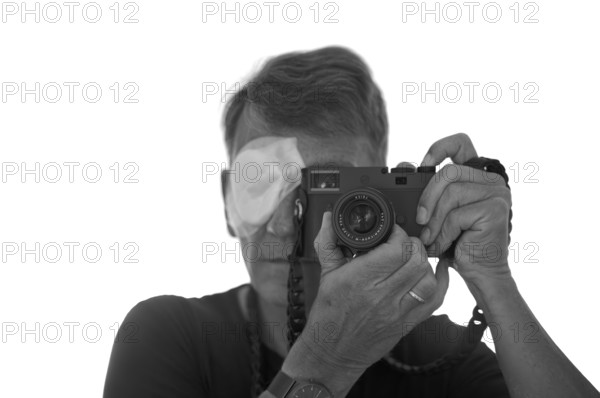 Portrait, self-portrait, selfie, photographer with eye bandage, eye injury, bandage on eye, looking