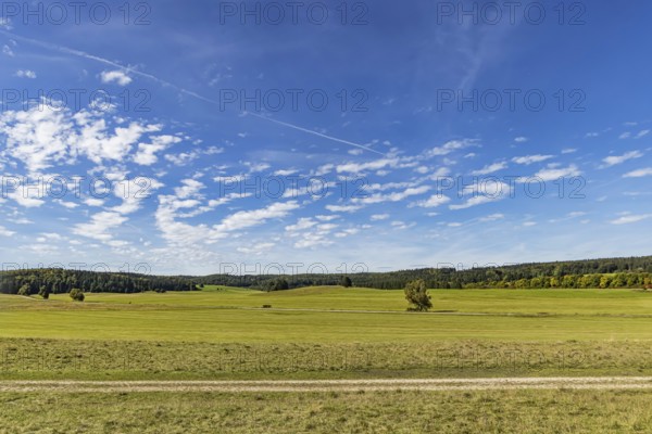 Pristine landscape in the Swabian Alb biosphere reserve with blue skies and small clouds. The