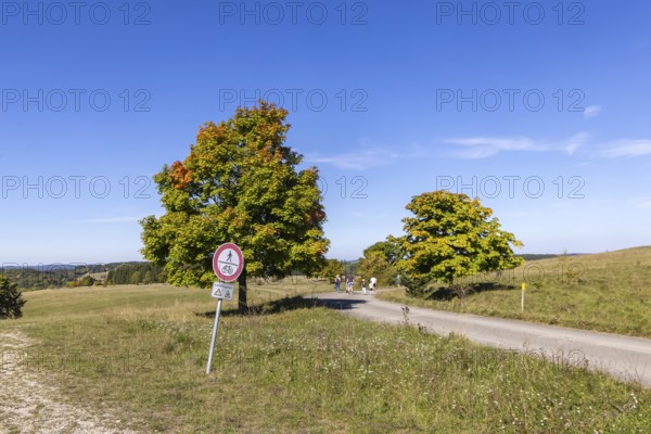 Hikers in the Swabian Alb biosphere reserve. The former military training area in Münsingen is an