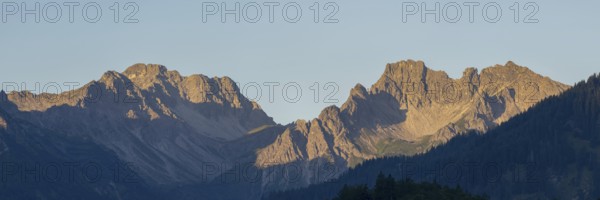 Mountain panorama at sunrise from Stillachtal into Warrmatsgundtal, on the left Alpgundkopf,