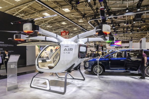 Exhibition stand of the Chinese manufacturer GAC, Guangzhou Automobile Group. Govy air taxi. Model