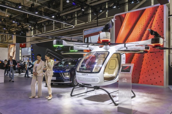 Exhibition stand of the Chinese manufacturer GAC, Guangzhou Automobile Group. Govy air taxi. Model