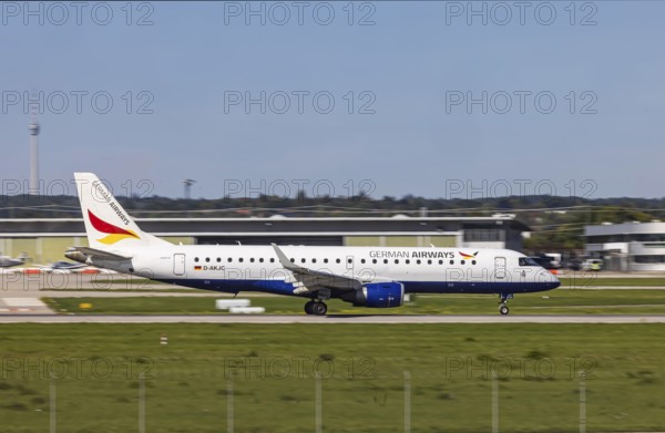 Stuttgart Airport with aircraft on the runway. Aircraft registration number: D-AKJC, German