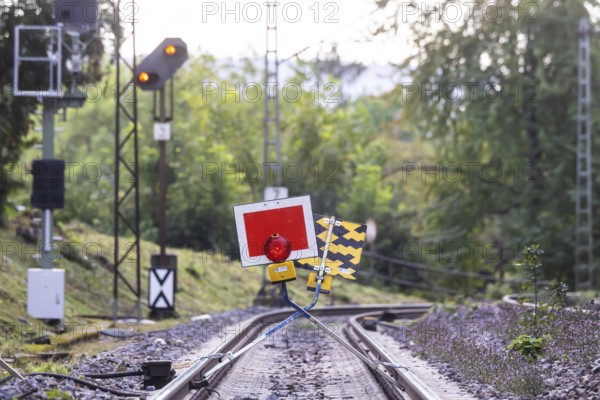 Track closed. The signal is called Sh2 (protective stop) . The stop sign is placed in front of